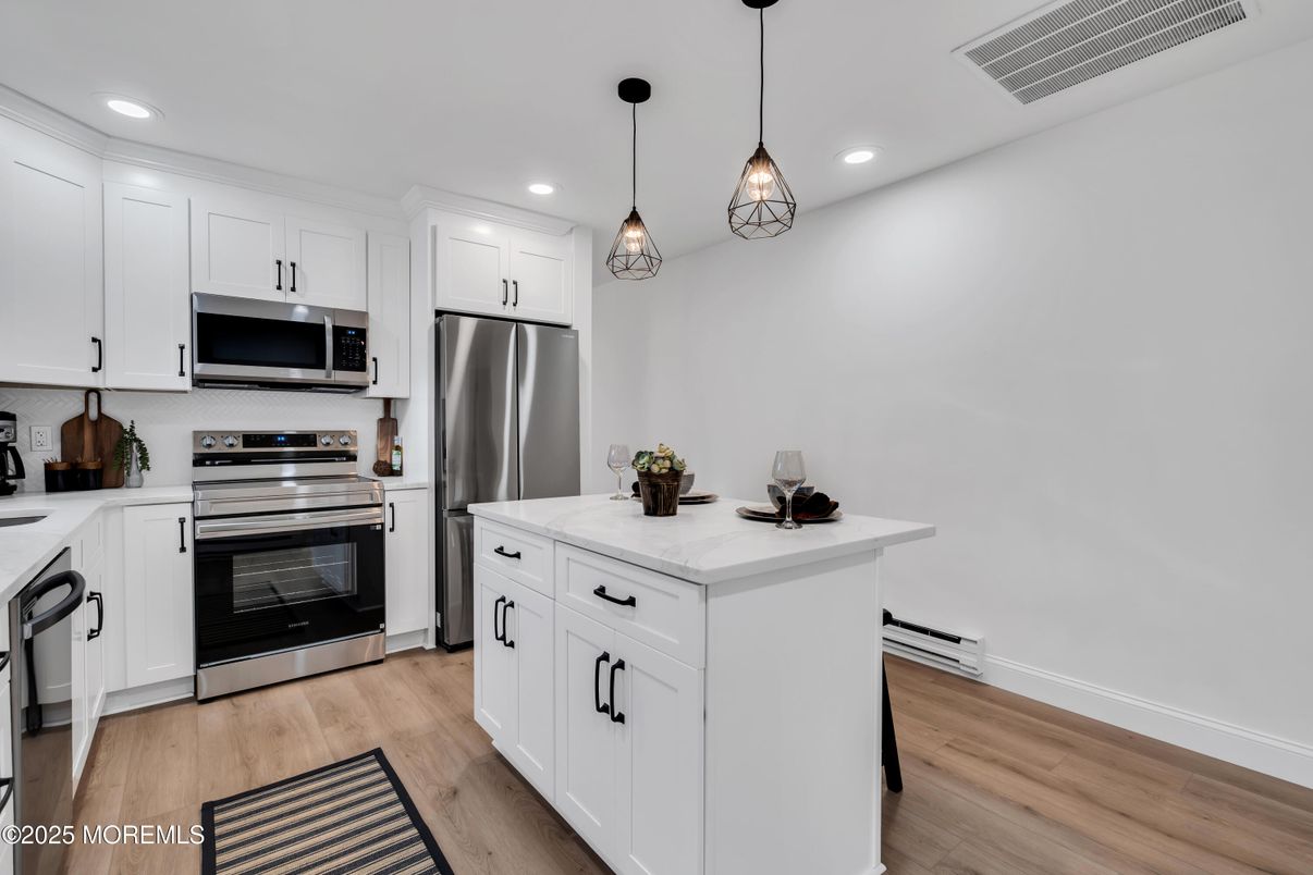 Interior, Kitchen, Pendant Lights, Recessed Lighting, Stainless Steel Appliances, Wood Texture Flooring