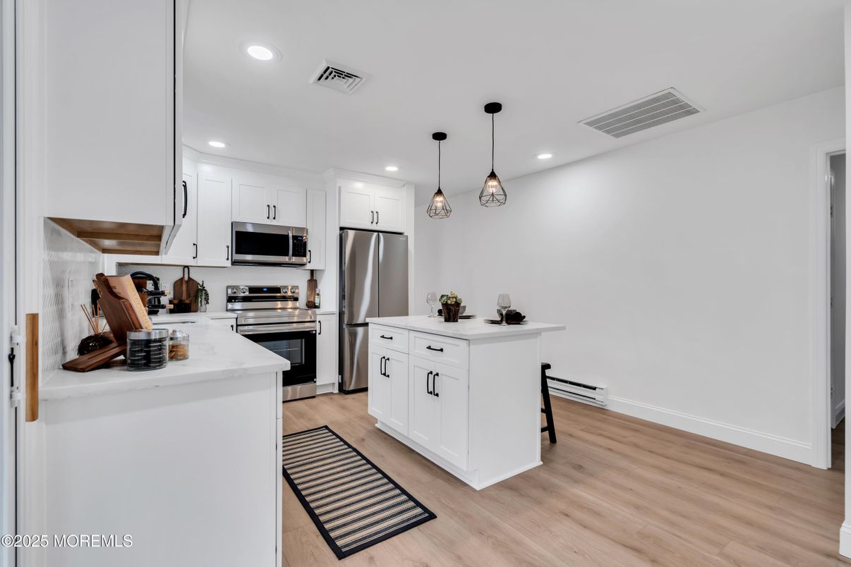 Interior, Kitchen, Pendant Lights, Recessed Lighting, Stainless Steel Appliances, Wood Texture Flooring
