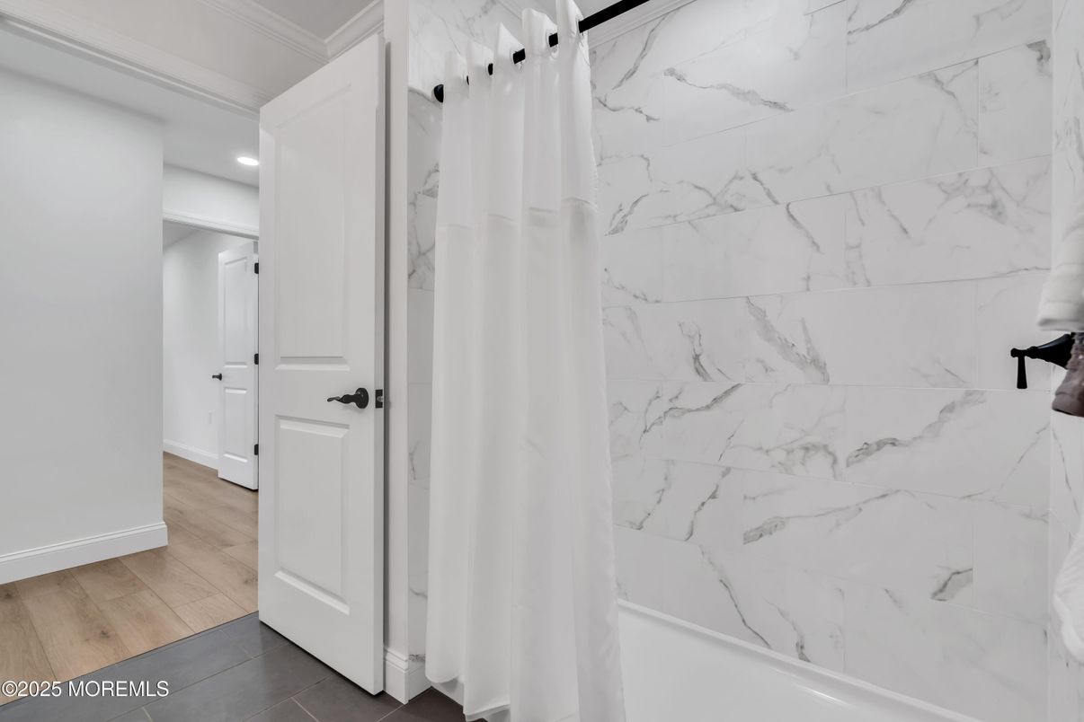 Bathroom, Interior, Marble Walls, Recessed Lighting, Wood Texture Flooring