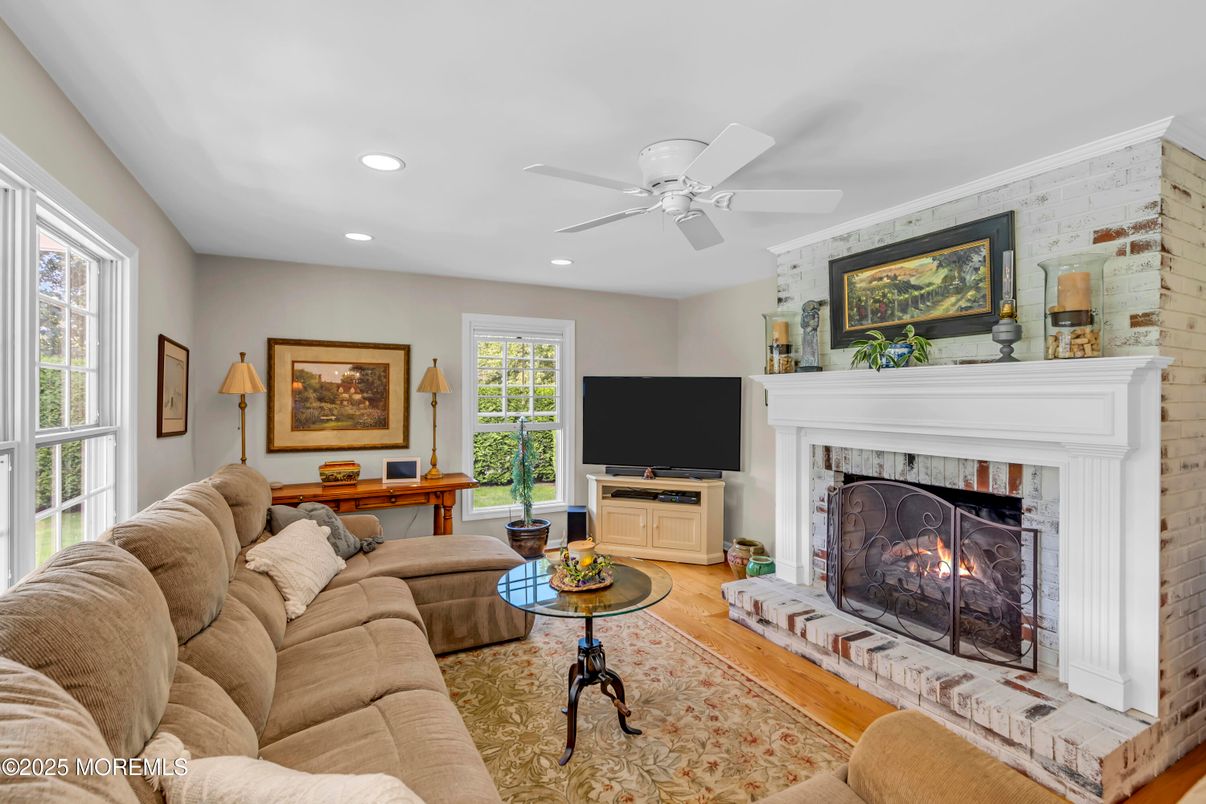 Fireplace, Interior, Living room, Recessed Lighting, Wood Texture Flooring