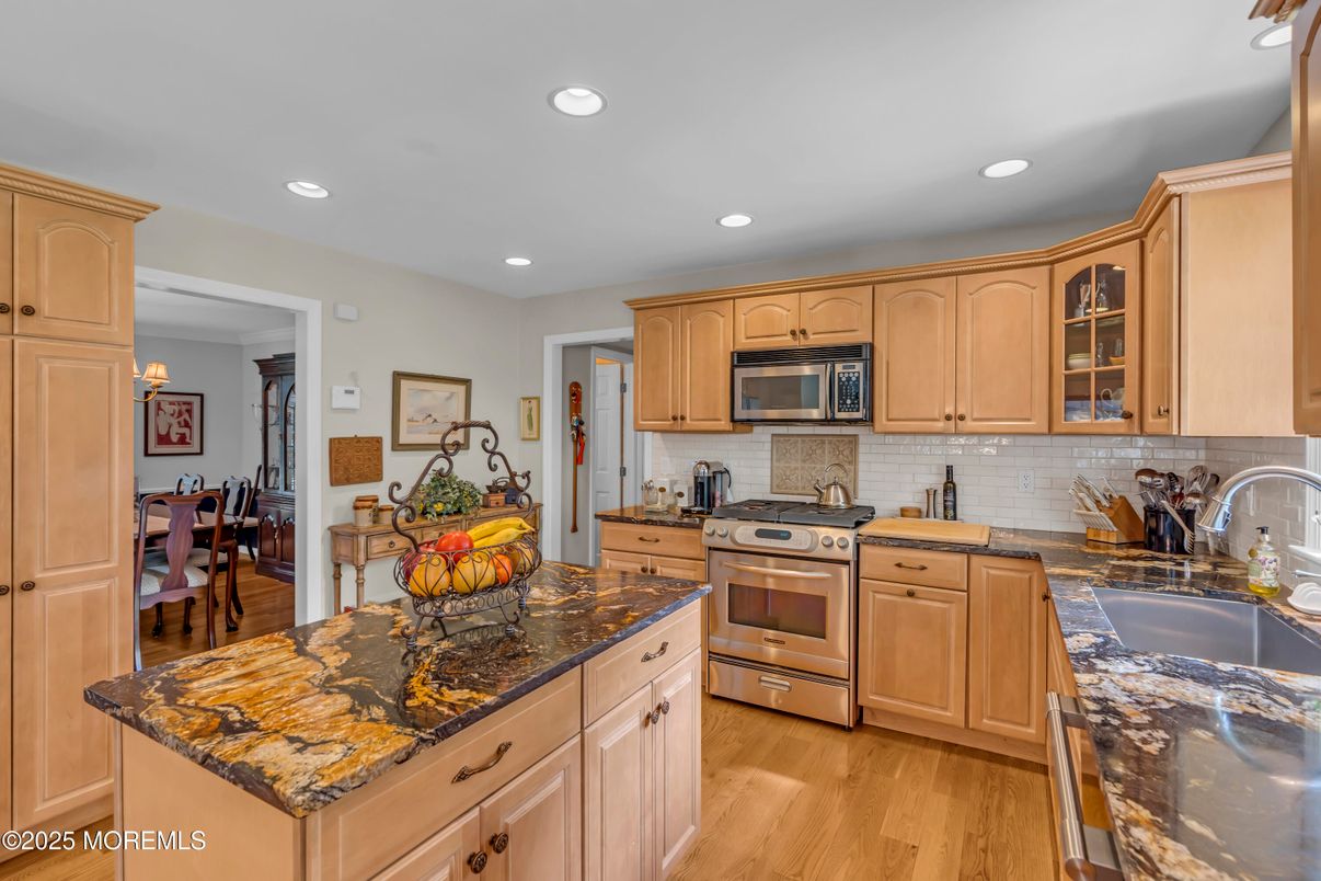 Dining room, Interior, Kitchen, Recessed Lighting, Stainless Steel Appliances, Wood Texture Flooring