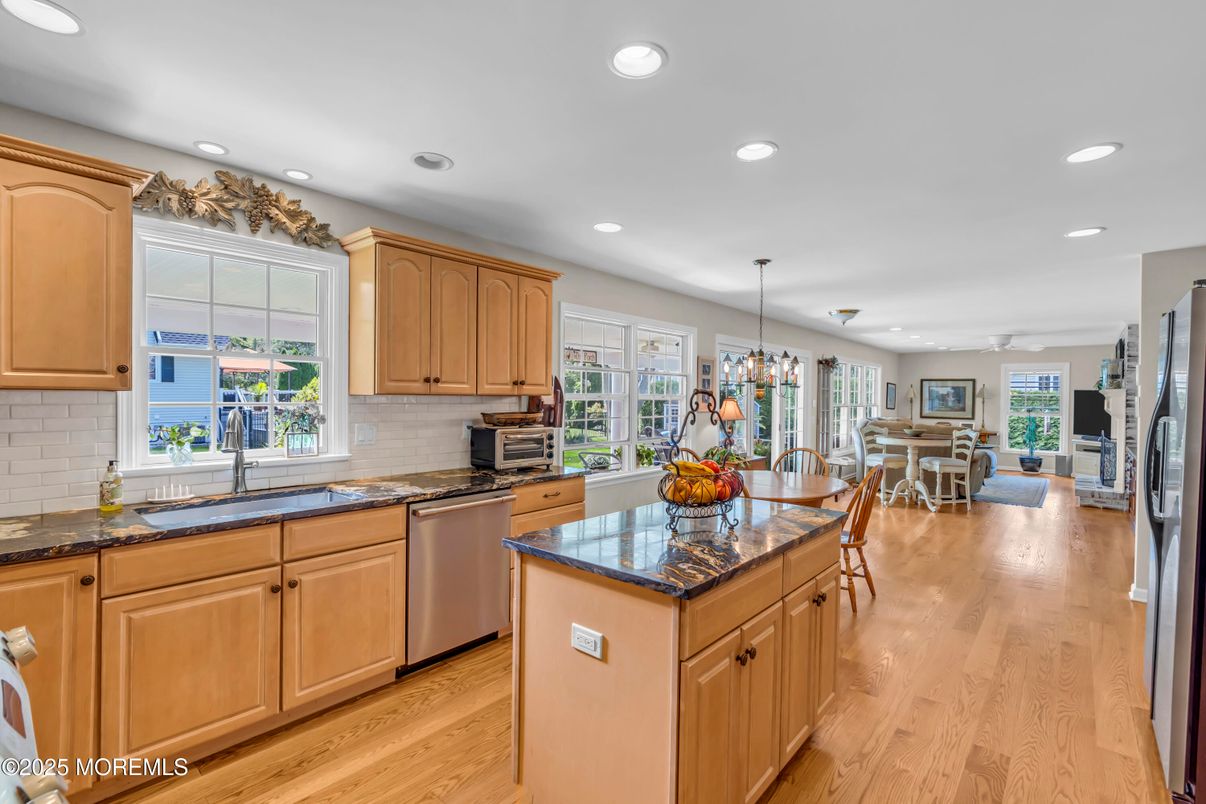 Dining room, Interior, Kitchen, Pendant Lights, Recessed Lighting, Stainless Steel Appliances, Wood Texture Flooring