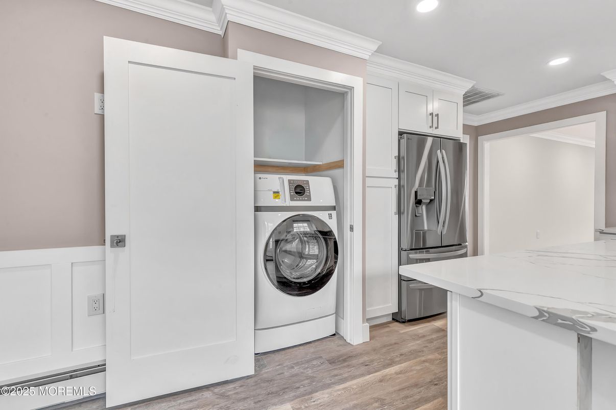 Interior, Kitchen, Recessed Lighting, Utility Closets, Washer, Wood Texture Flooring