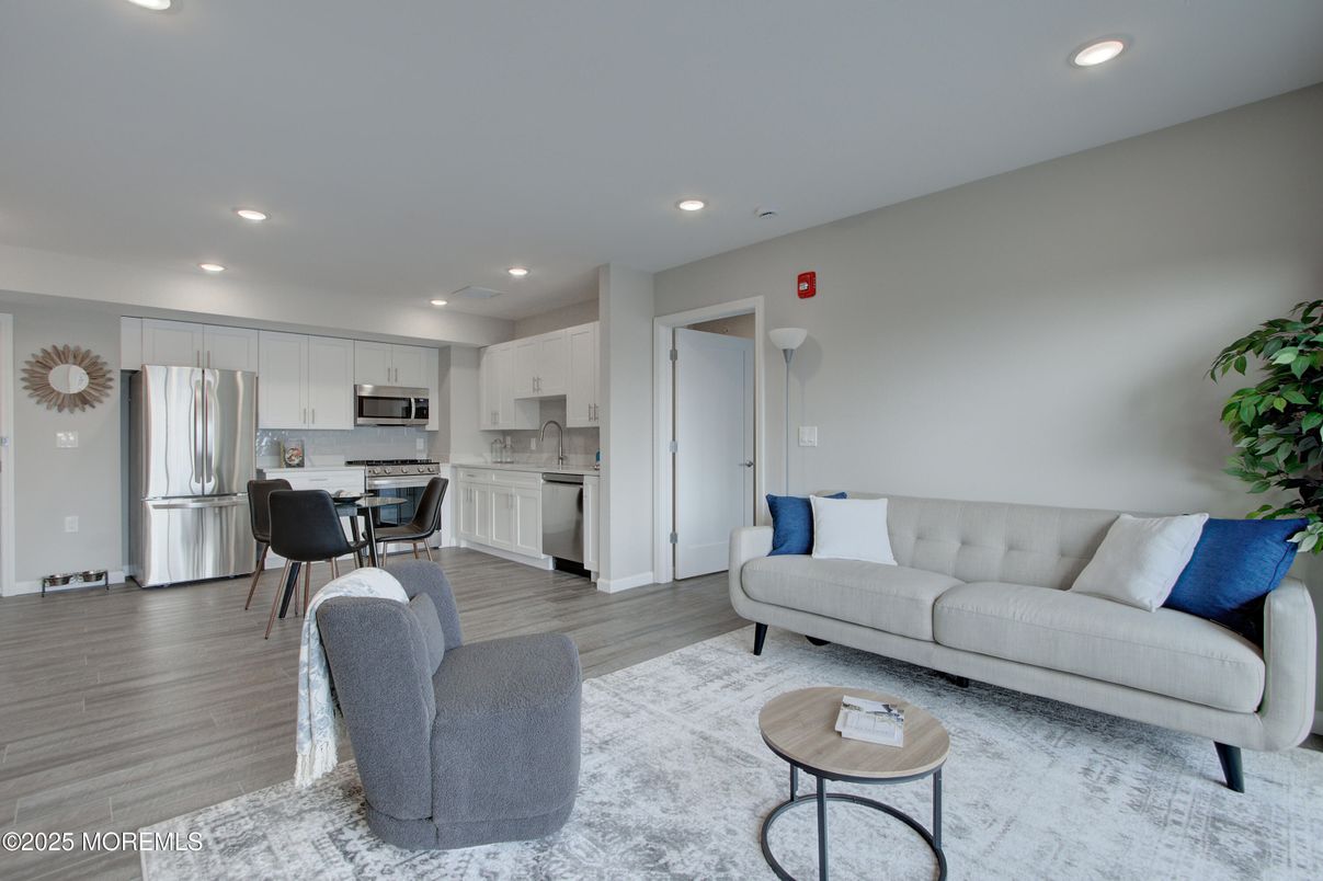 Dining room, Interior, Kitchen, Living room, Recessed Lighting, Stainless Steel Appliances, Wood Texture Flooring