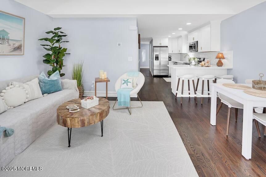 Dining room, Interior, Kitchen, Living room, Recessed Lighting, Stainless Steel Appliances, Wood Texture Flooring