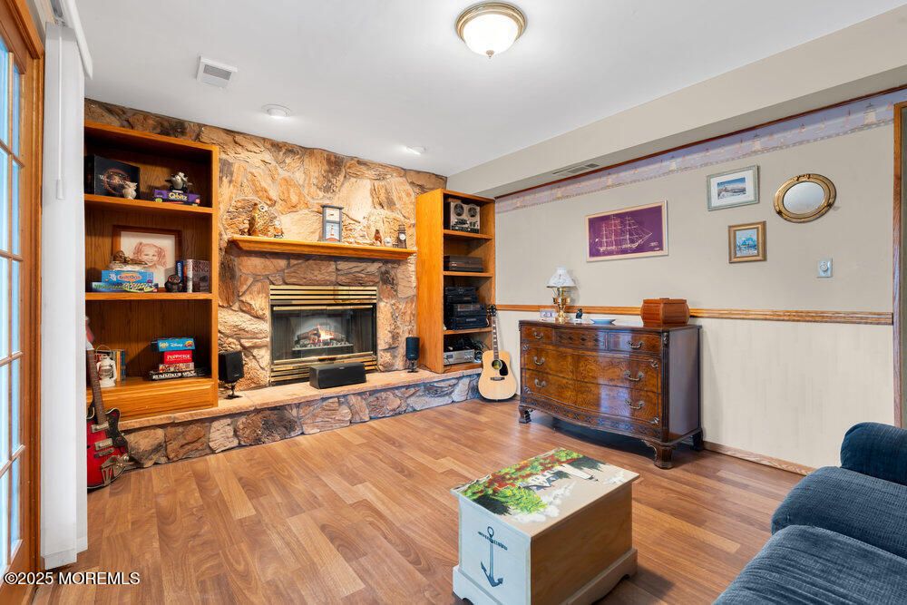 Fireplace, Interior, Recessed Lighting, Stone Walls, Wood Texture Flooring