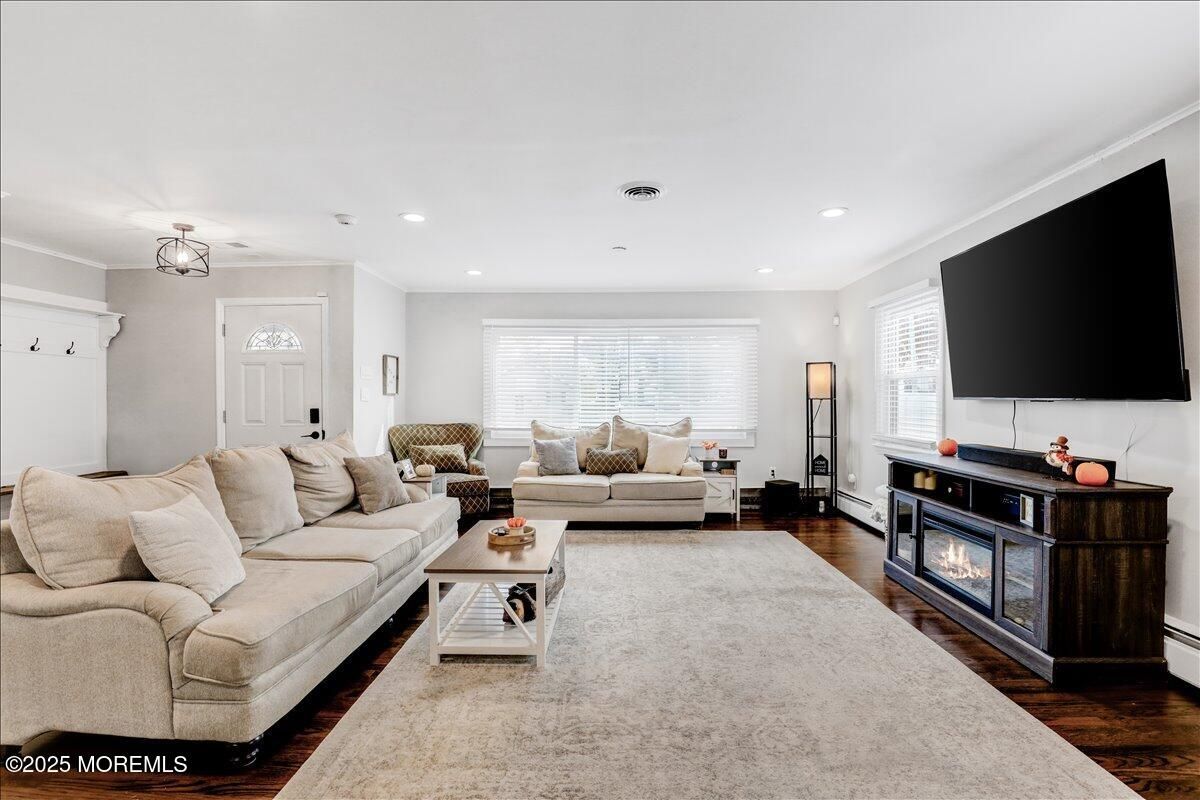 Fireplace, Interior, Living room, Recessed Lighting, Wood Texture Flooring