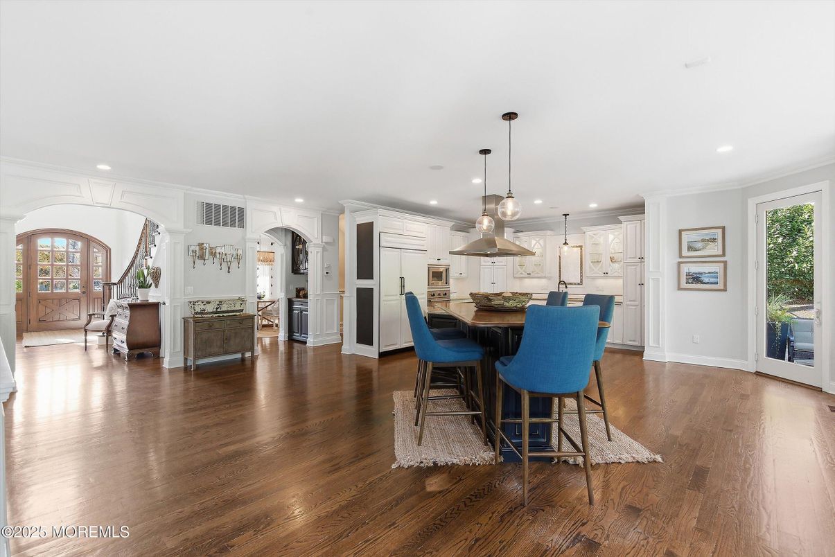Dining room, Interior, Kitchen, Pendant Lights, Recessed Lighting, Stainless Steel Appliances, Wood Texture Flooring