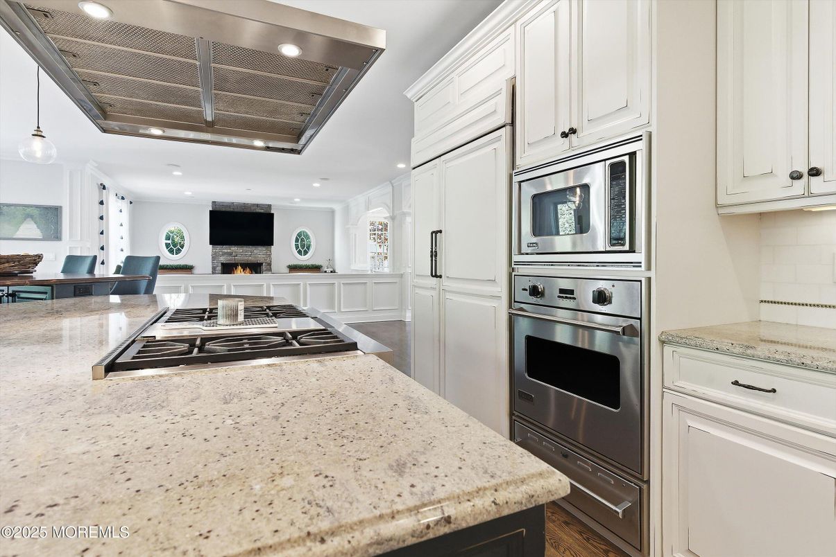 Fireplace, Interior, Kitchen, Pendant Lights, Recessed Lighting, Stainless Steel Appliances