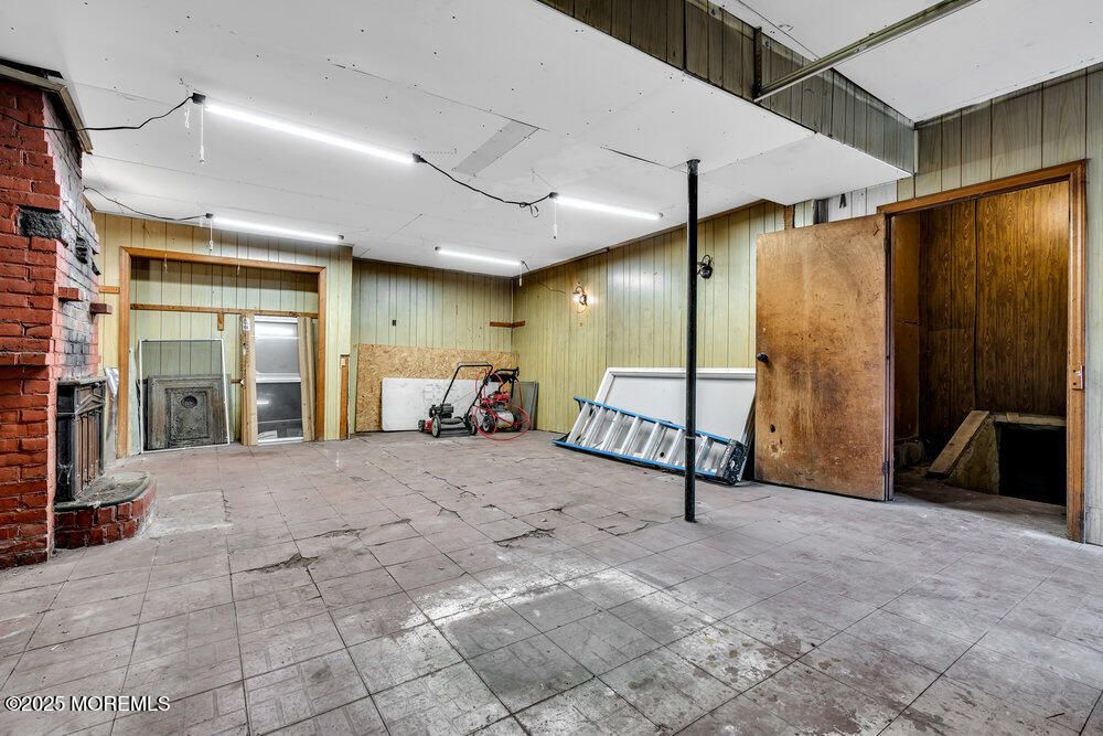 Elevator, Empty room, Fireplace, Interior, Recessed Lighting, Wooden Walls