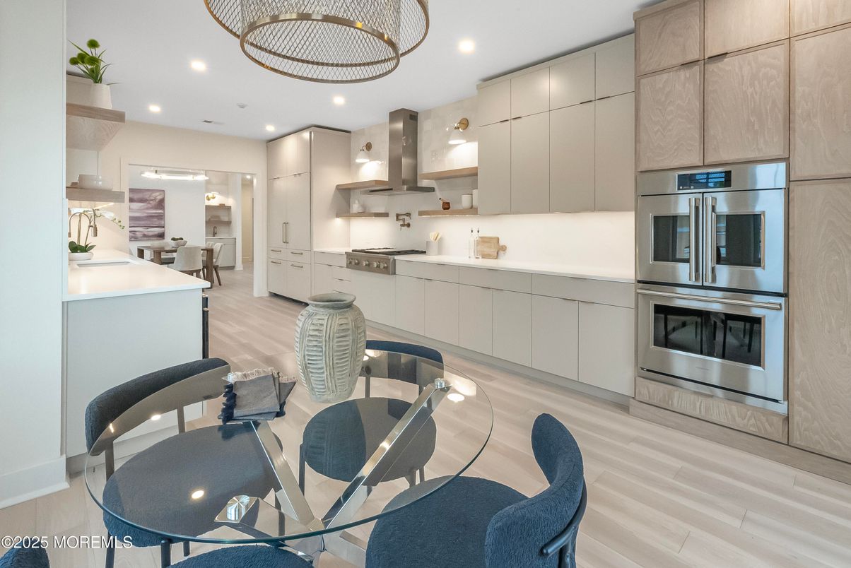 Dining room, Interior, Kitchen, Recessed Lighting, Stainless Steel Appliances, Wood Texture Flooring