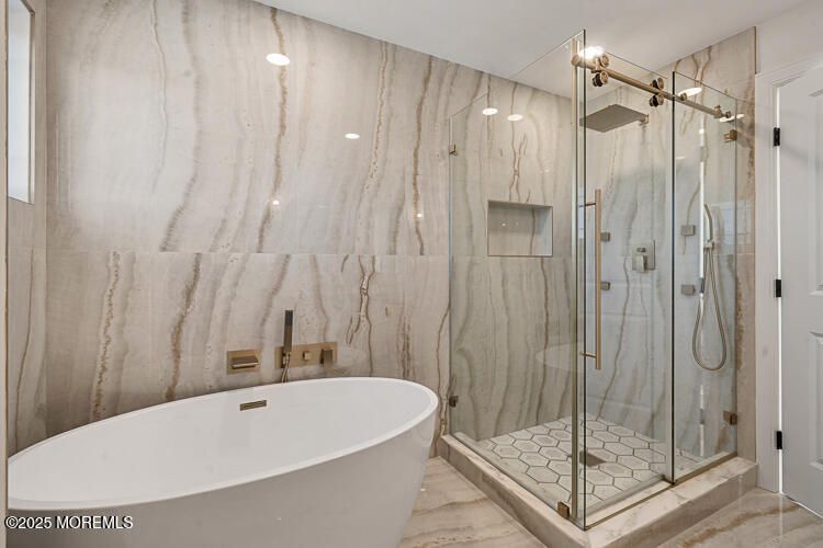 Bathroom, Free Standing Baths, Glass Shower, Interior, Marble Walls, Recessed Lighting