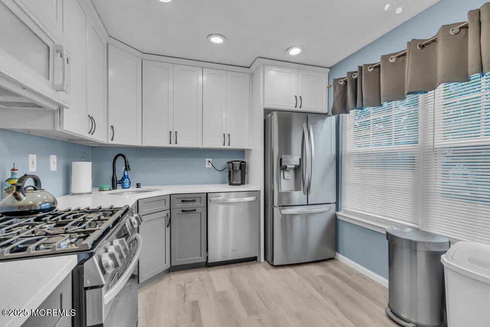 Interior, Kitchen, Recessed Lighting, Stainless Steel Appliances, Wood Texture Flooring