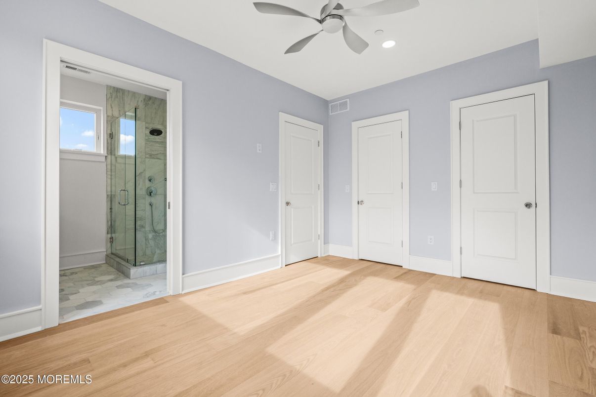 Bathroom, Empty room, Glass Shower, Interior, Recessed Lighting, Wood Texture Flooring