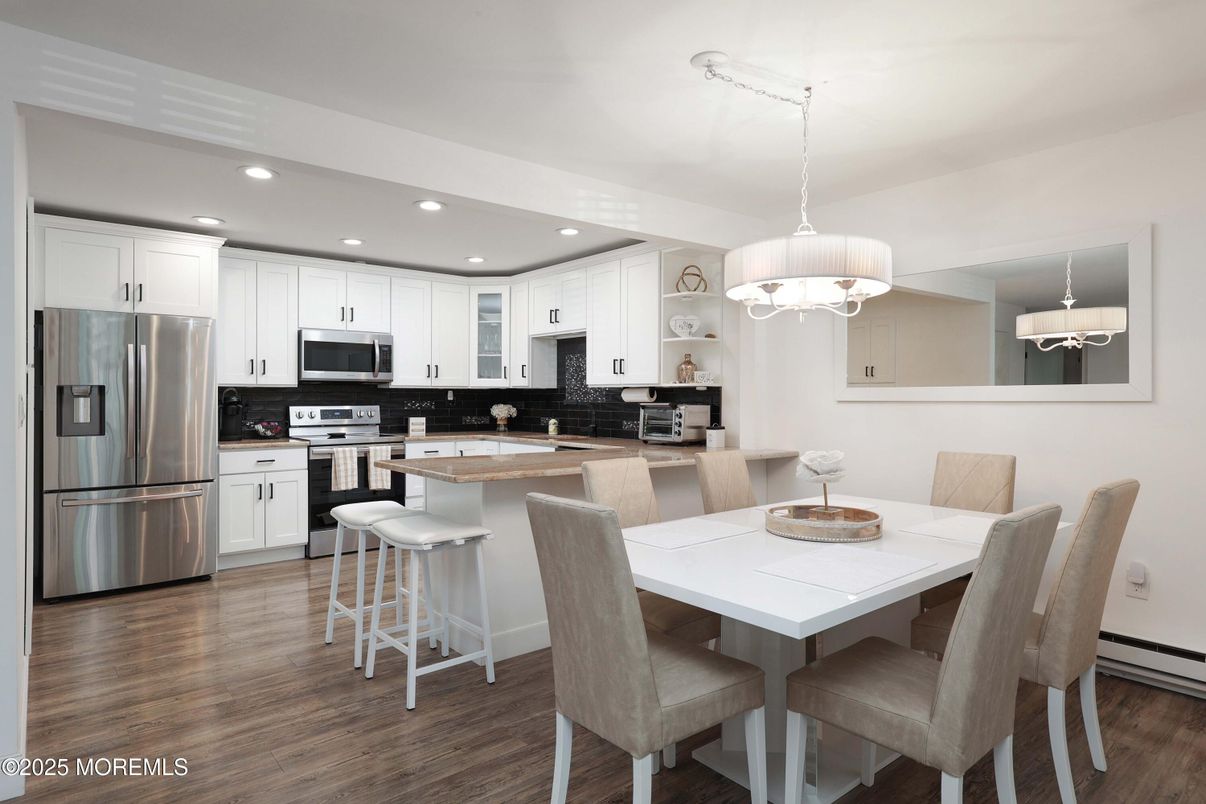 Chandelier, Dining room, Interior, Kitchen, Pendant Lights, Recessed Lighting, Stainless Steel Appliances, Wood Texture Flooring