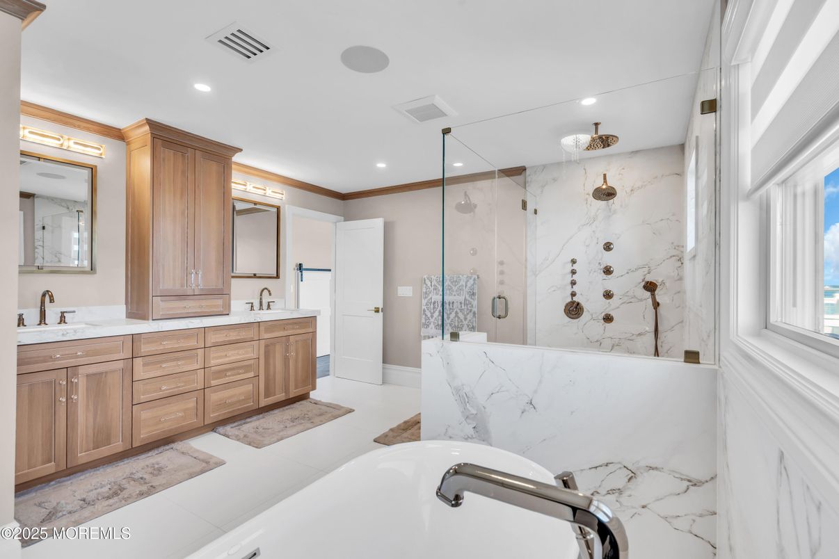 Bathroom, Dual Sink Vanities, Glass Shower, Interior, Marble Walls, Recessed Lighting