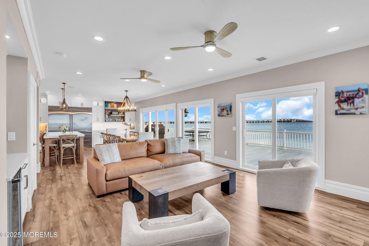 Chandelier, Dining room, Interior, Living room, Recessed Lighting, Water, Wood Texture Flooring