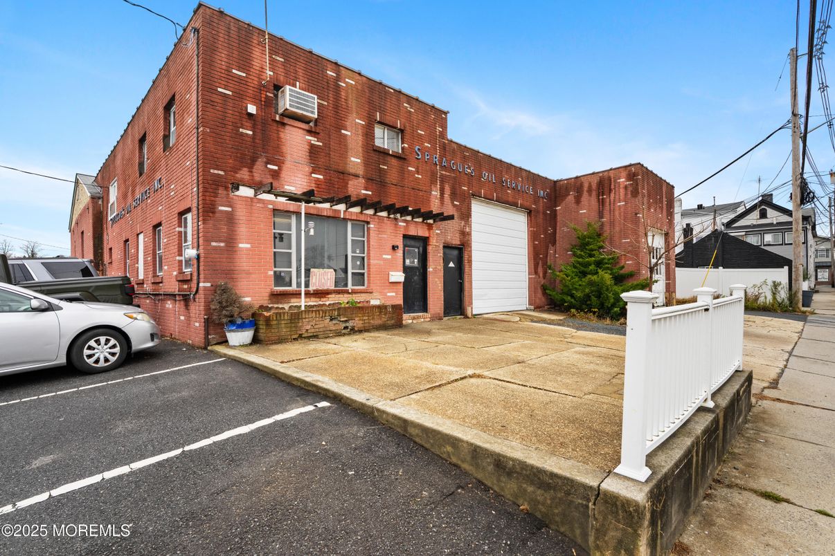 Attached, Exterior, Facade, Brick Facade, Condo Building