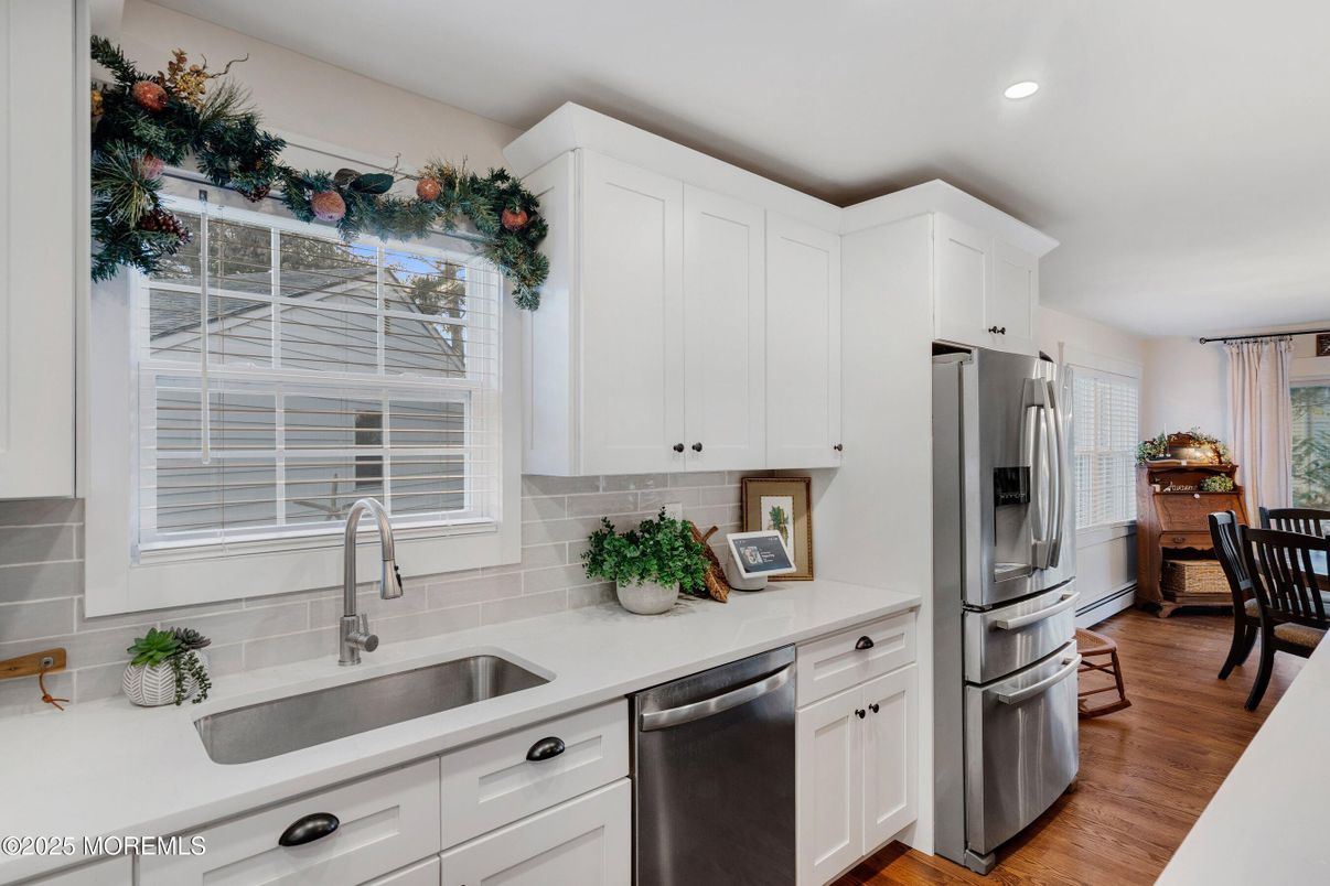 Dining room, Interior, Kitchen, Recessed Lighting, Stainless Steel Appliances, Wood Texture Flooring