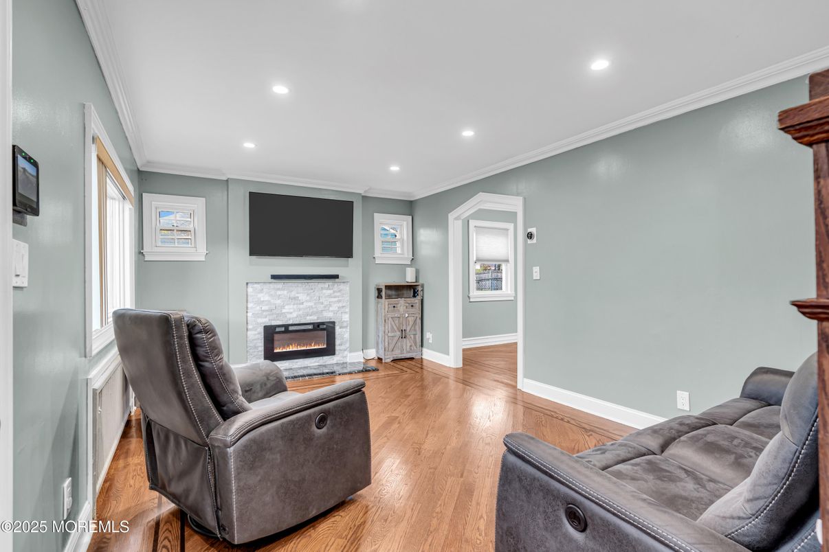 Fireplace, Interior, Living room, Recessed Lighting, Wood Texture Flooring