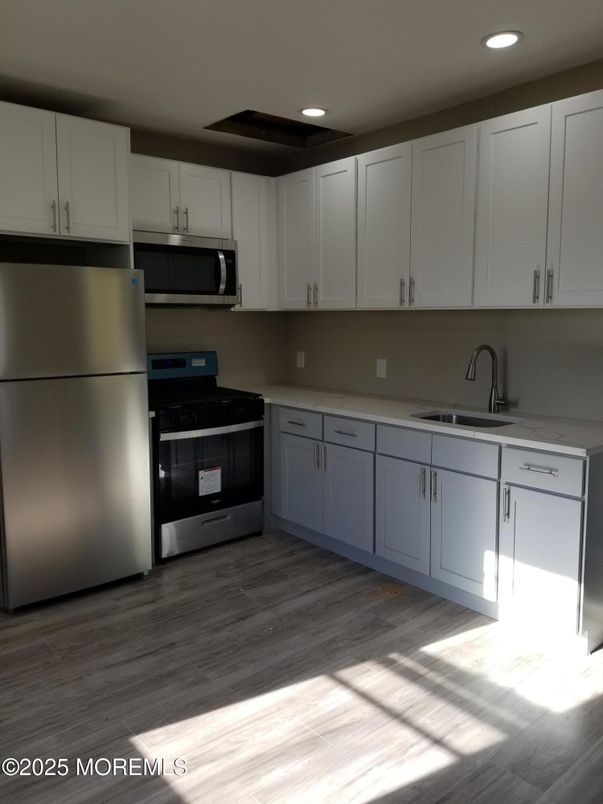 Interior, Kitchen, Recessed Lighting, Stainless Steel Appliances, Wood Texture Flooring