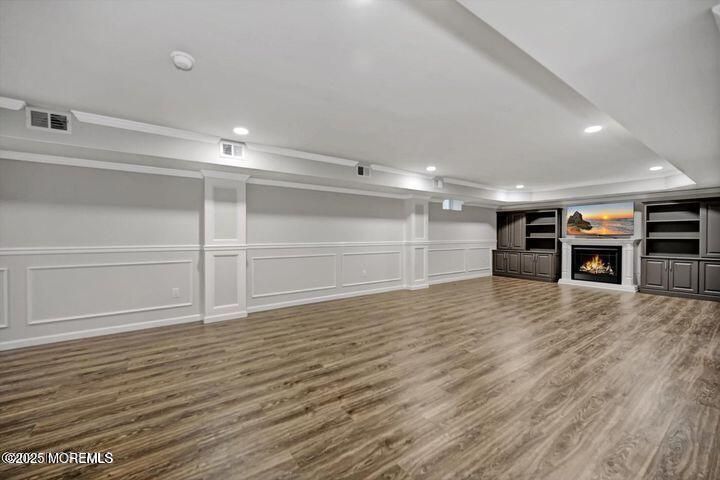 Empty room, Fireplace, Interior, Recessed Lighting, Wood Texture Flooring