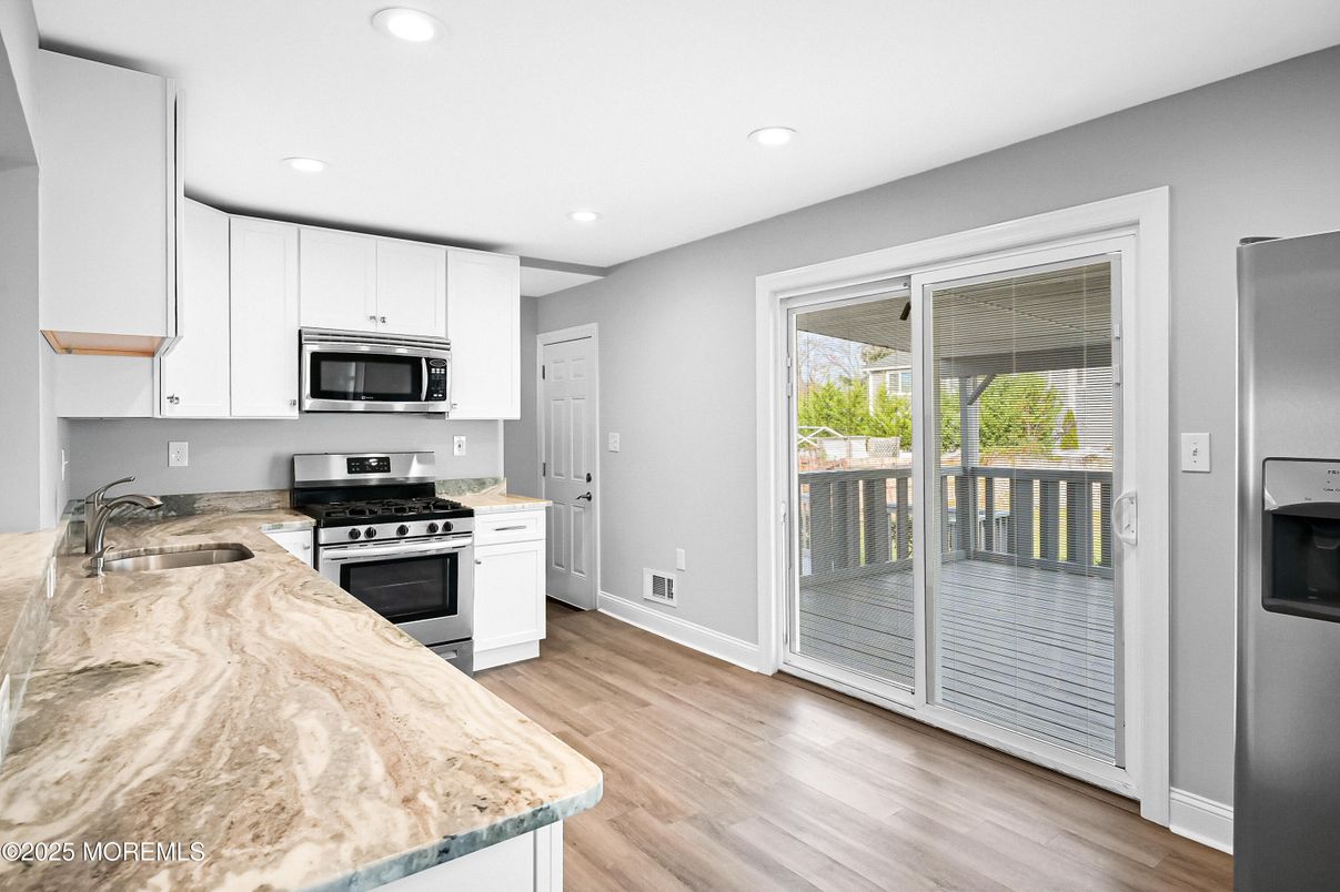 Interior, Kitchen, Recessed Lighting, Stainless Steel Appliances, Wood Texture Flooring