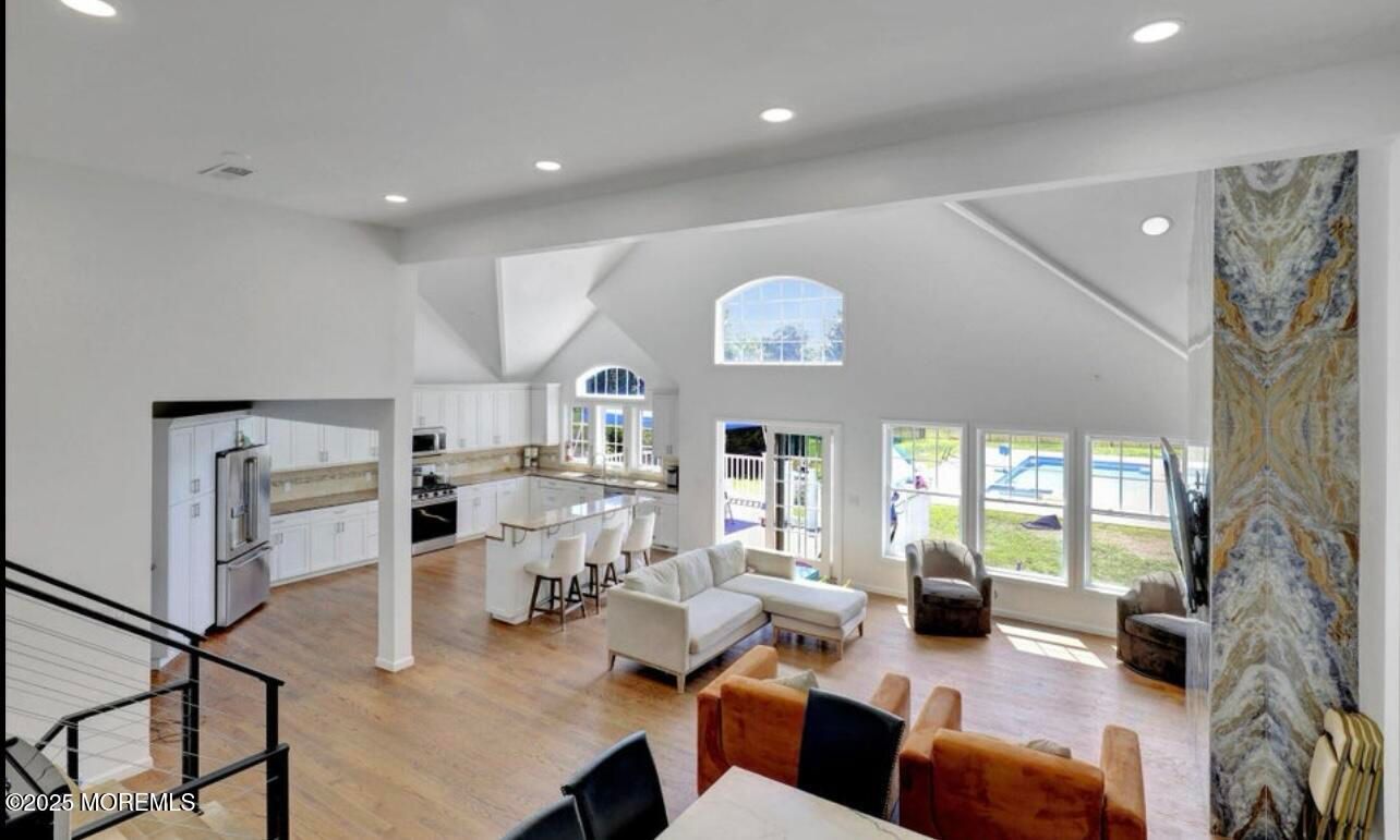 Dining room, Interior, Kitchen, Living room, Recessed Lighting, Stainless Steel Appliances, Wood Texture Flooring