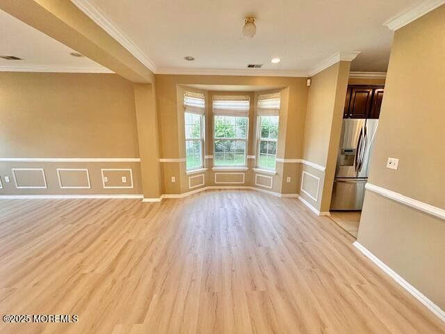 Empty room, Interior, Kitchen, Recessed Lighting, Stainless Steel Appliances, Wood Texture Flooring