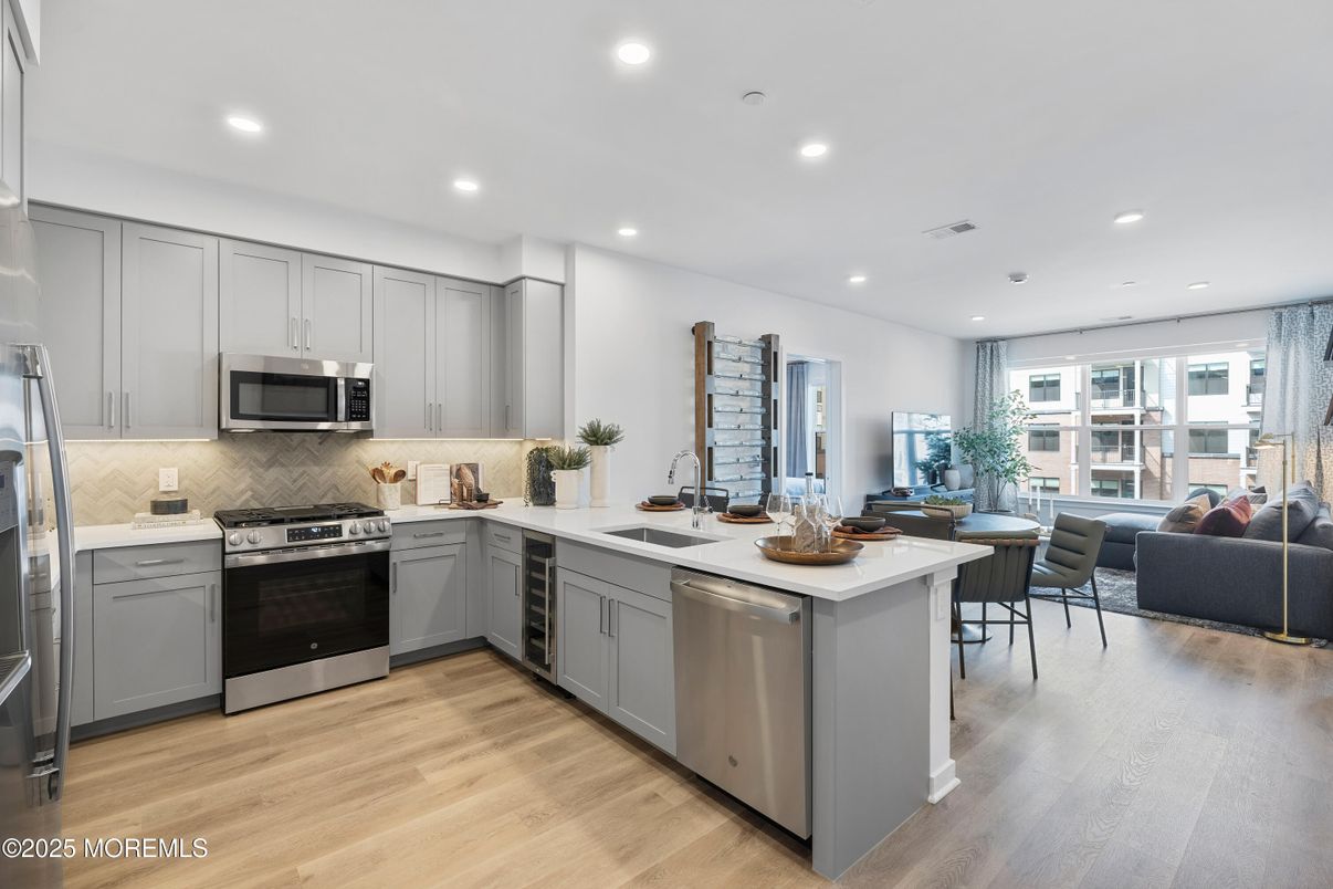 Dining room, Interior, Kitchen, Recessed Lighting, Stainless Steel Appliances, Wood Texture Flooring