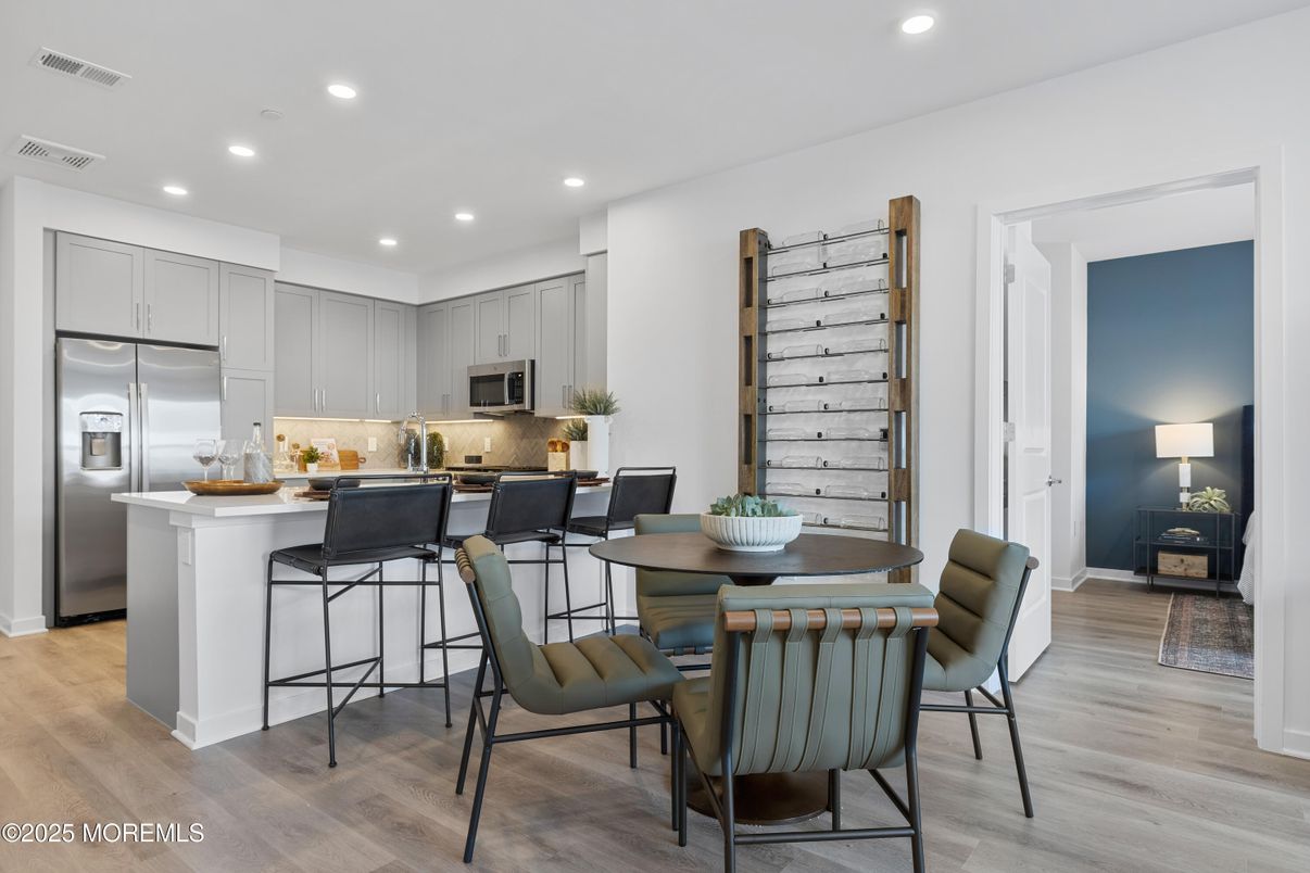 Dining room, Interior, Kitchen, Recessed Lighting, Stainless Steel Appliances, Wood Texture Flooring
