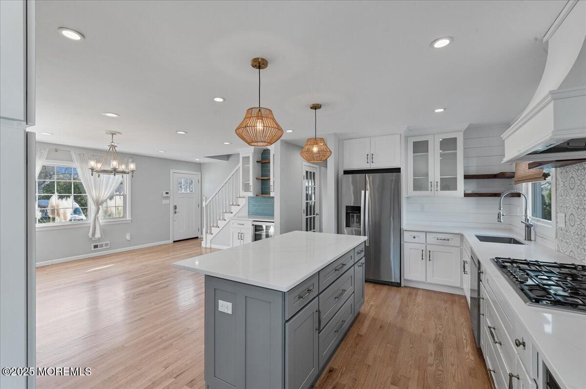 Chandelier, Interior, Kitchen, Pendant Lights, Recessed Lighting, Stainless Steel Appliances, Wood Texture Flooring