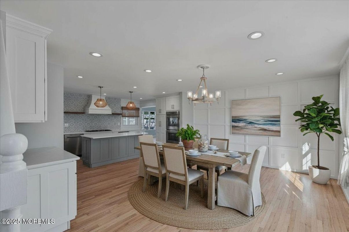 Chandelier, Dining room, Interior, Kitchen, Pendant Lights, Recessed Lighting, Stainless Steel Appliances, Wood Texture Flooring