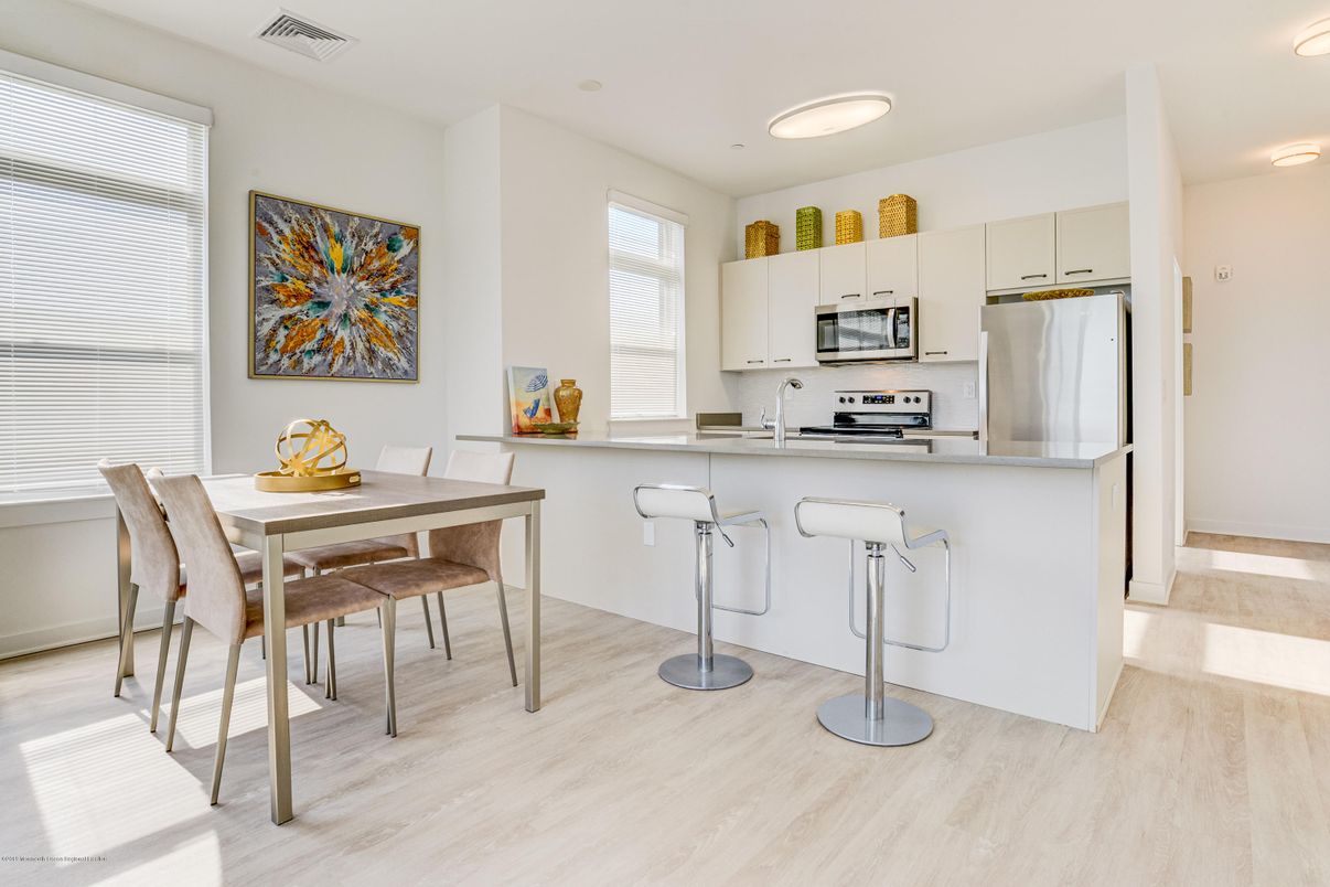 Dining room, Interior, Kitchen, Recessed Lighting, Stainless Steel Appliances, Wood Texture Flooring