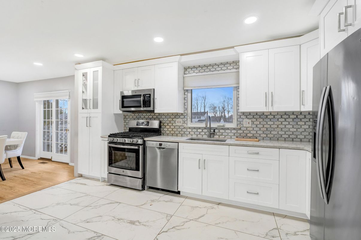 Interior, Kitchen, Marble, Recessed Lighting, Stainless Steel Appliances, Wood Texture Flooring