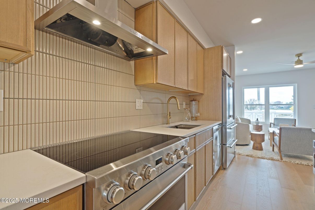 Dining room, Interior, Kitchen, Recessed Lighting, Stainless Steel Appliances, Wood Texture Flooring