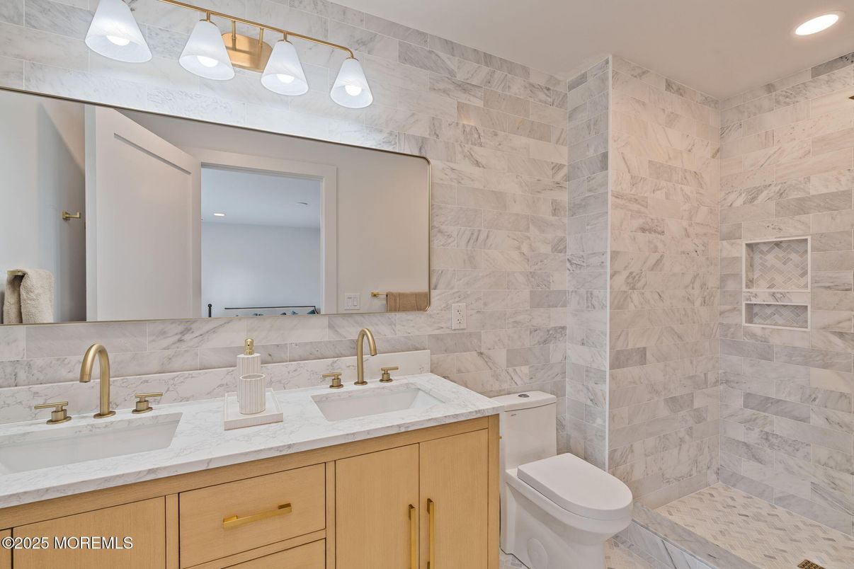 Bathroom, Dual Sink Vanities, Interior, Marble Walls, Recessed Lighting