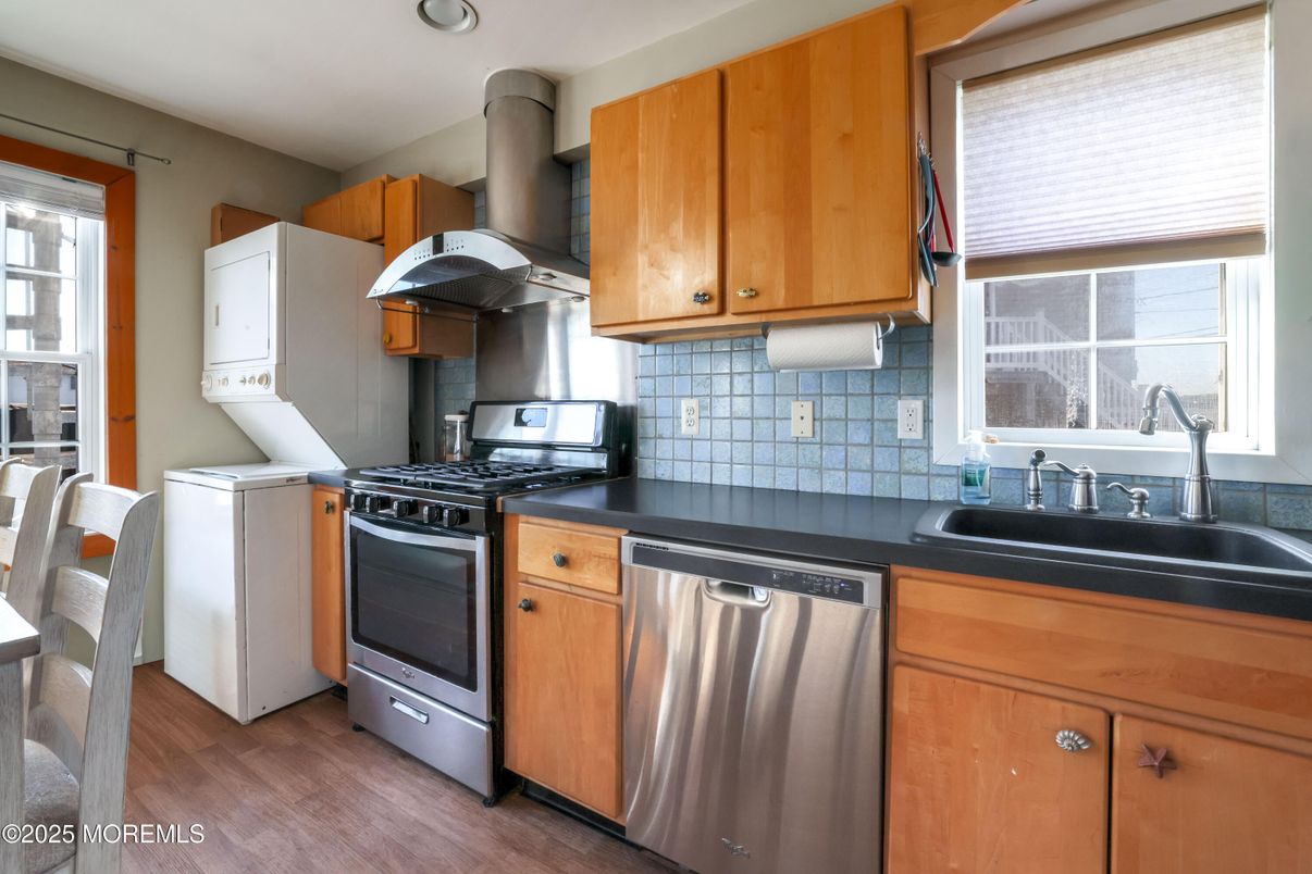 Interior, Kitchen, Recessed Lighting, Stainless Steel Appliances, Washer, Wood Texture Flooring