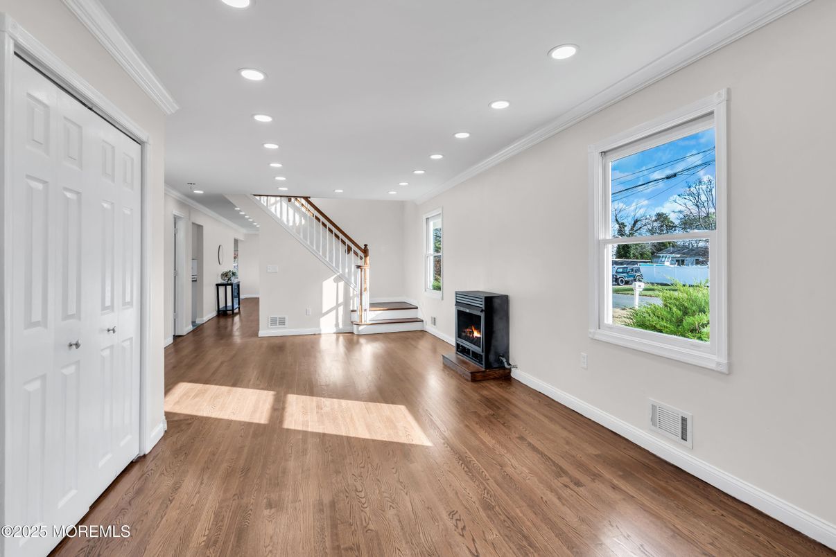 Empty room, Fireplace, Interior, Recessed Lighting, Wood Texture Flooring