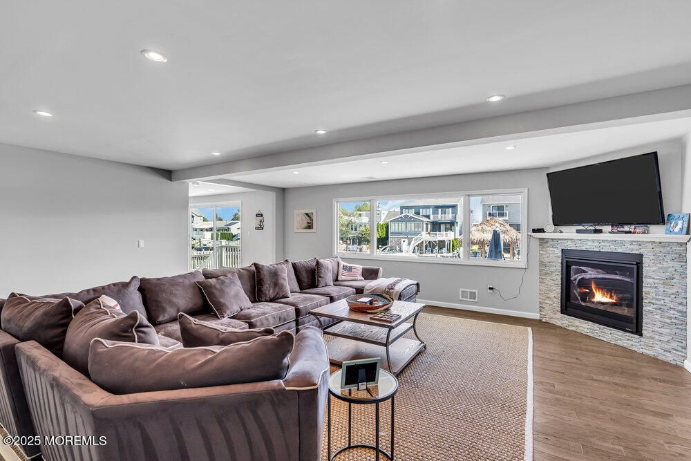 Fireplace, Interior, Living room, Recessed Lighting, Wood Texture Flooring