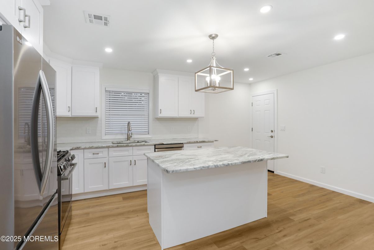 Interior, Kitchen, Pendant Lights, Recessed Lighting, Stainless Steel Appliances, Wood Texture Flooring