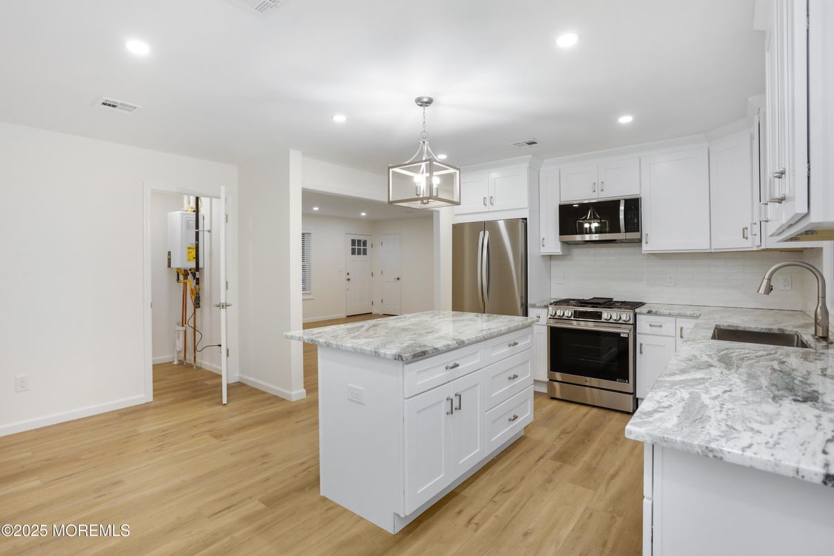 Interior, Kitchen, Pendant Lights, Recessed Lighting, Stainless Steel Appliances, Wood Texture Flooring