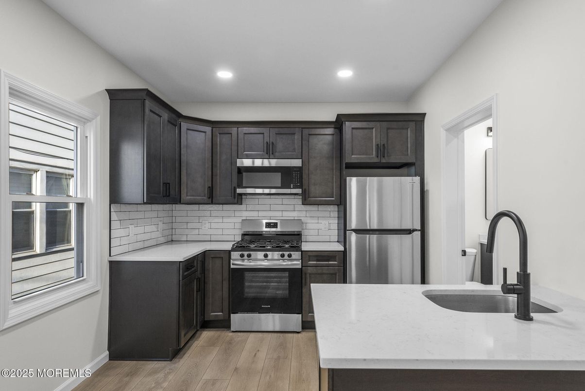 Interior, Kitchen, Recessed Lighting, Stainless Steel Appliances, Wood Texture Flooring