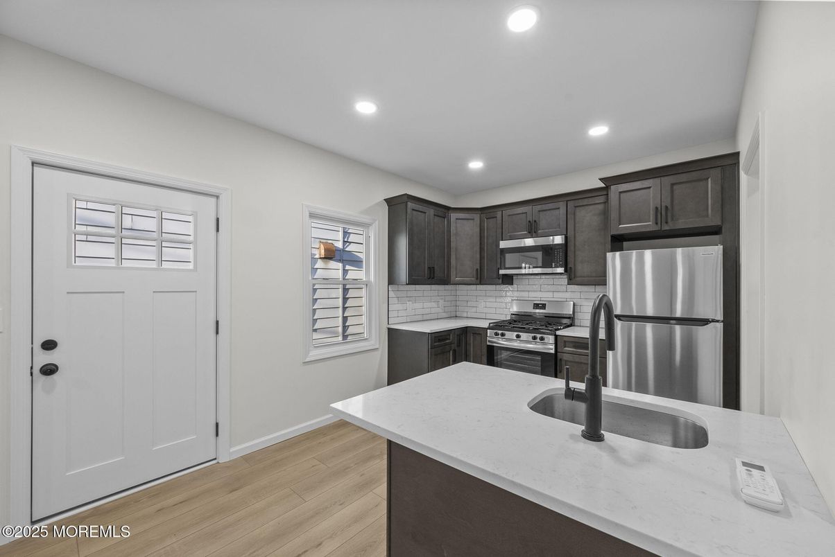Interior, Kitchen, Recessed Lighting, Stainless Steel Appliances, Wood Texture Flooring