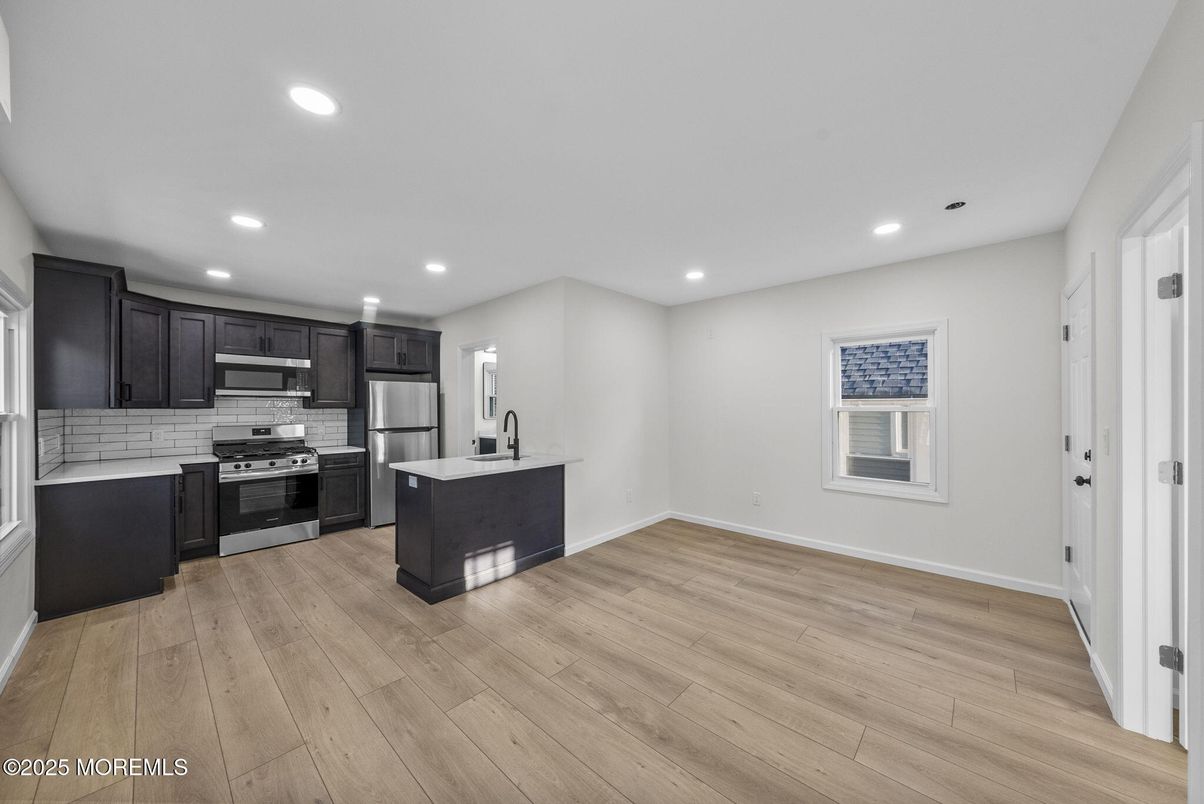 Interior, Kitchen, Recessed Lighting, Stainless Steel Appliances, Wood Texture Flooring