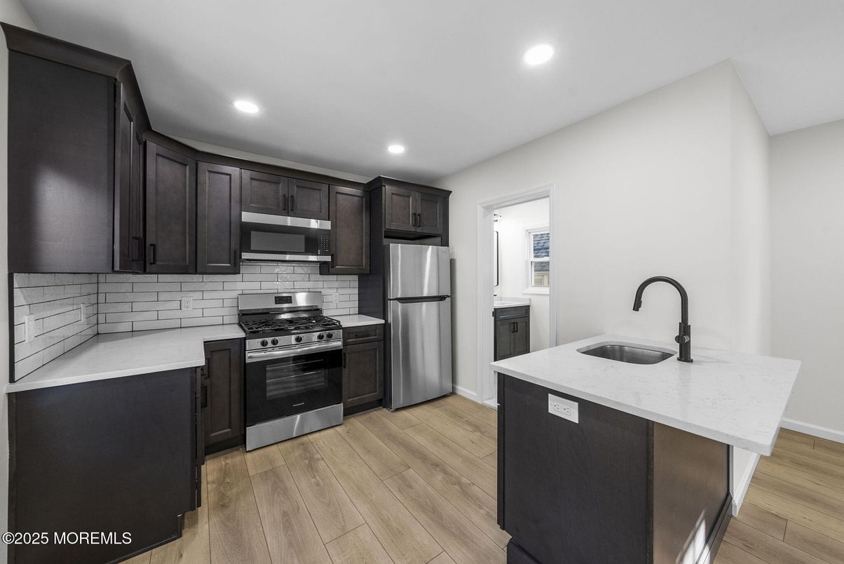 Interior, Kitchen, Recessed Lighting, Stainless Steel Appliances, Wood Texture Flooring