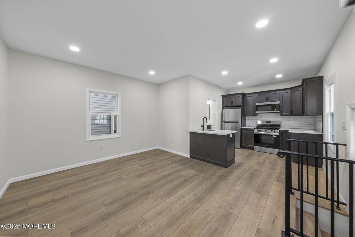 Interior, Kitchen, Recessed Lighting, Stainless Steel Appliances, Wood Texture Flooring