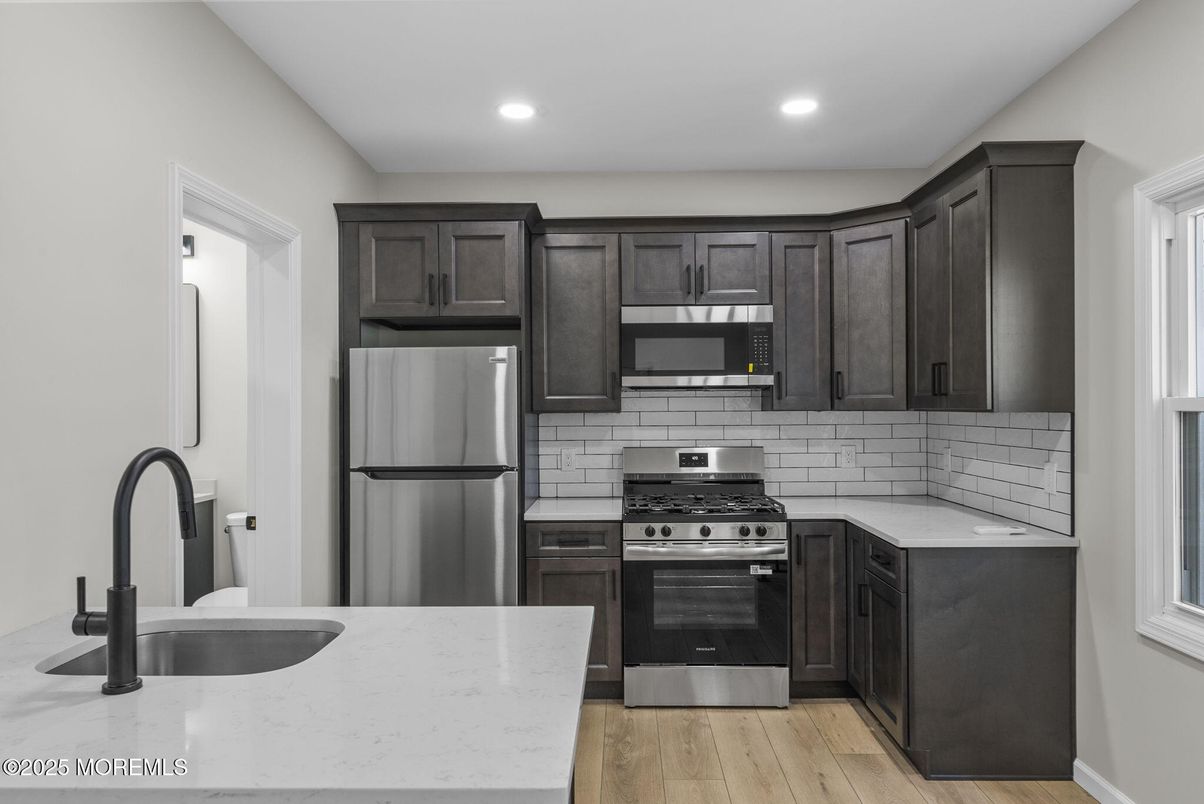 Interior, Kitchen, Recessed Lighting, Stainless Steel Appliances, Wood Texture Flooring