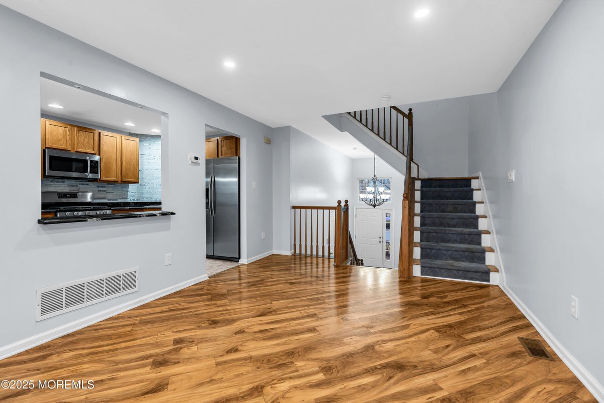 Chandelier, Interior, Kitchen, Recessed Lighting, Stainless Steel Appliances, Wood Texture Flooring