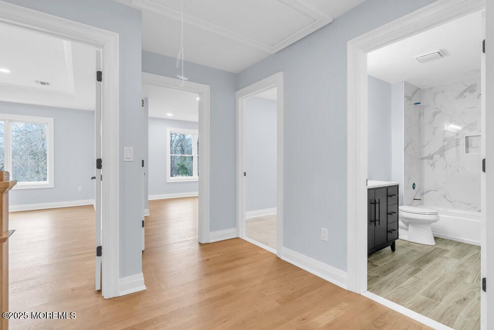 Bathroom, Interior, Marble Walls, Recessed Lighting, Wood Texture Flooring